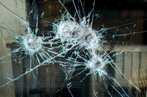 bullet marks in glass