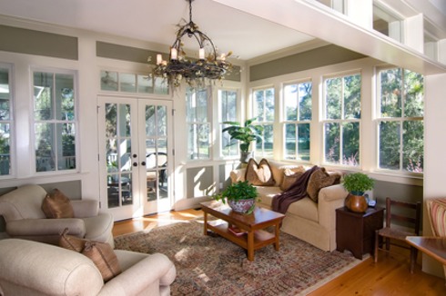 sunroom with large windows and glass doors